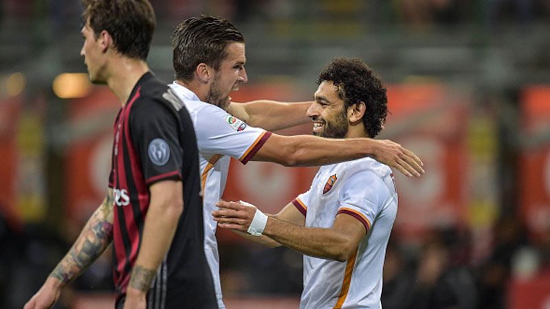 Pelatih Liverpool, Jurgen Klopp (insert: Logo AS Roma). Copyright: Â© INDOSPORT